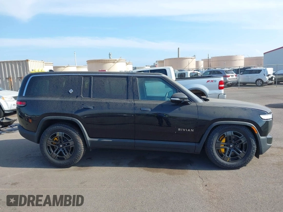 2023 Rivian R1S Adventure z VIN 7PDSGABA8PN020504, wystawiony jako IAAI lot #42025341 z przebiegiem 5989 mil mil oraz . Historia ofert i sprzedaży dostępna na DreamBid. Obrazek 14.
