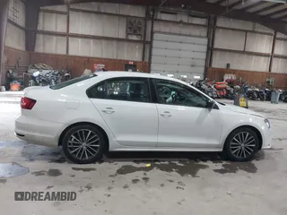2015 Volkswagen Jetta SE z VIN 3VWD17AJ2FM427343, wystawiony jako IAAI lot #42520443 z przebiegiem 60 409 mil mil oraz . Historia ofert i sprzedaży dostępna na DreamBid. Obrazek 13.