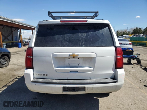 2019 Chevrolet Tahoe LT with VIN 1GNSKBKC5KR137818, listed as a Copart auction lot 50654885 with 138,334 mi miles and Salvage title. Bid and sale history available at DreamBid. Image 6.