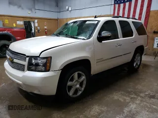 2012 Chevrolet Tahoe LTZ with VIN 1GNSKCE03CR312768, listed as a Copart auction lot 53049945 with 153,565 mi miles and Clean title. Bid and sale history available at DreamBid. Image 1.