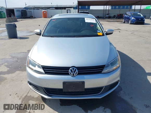 2014 Volkswagen Jetta TDI w/Premium with VIN 3VWLL7AJ6EM424935, listed as a IAAI auction lot 41533634 with 64,028 mi miles and . Bid and sale history available at DreamBid. Image 12.
