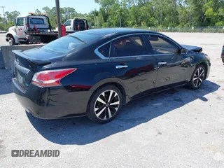 2014 Nissan Altima S with VIN 1N4AL3AP1EN345420, listed as a IAAI auction lot 42066721 with 145,581 mi miles and . Bid and sale history available at carsss.com. Image 4.