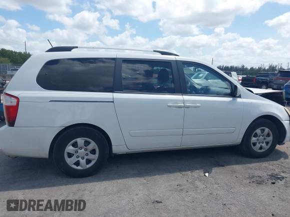 2010 Kia Sedona LX with VIN KNDMG4C33A6338047, listed as a IAAI auction lot 42128485 with 99,498 mi miles and . Bid and sale history available at carsss.com. Image 14.