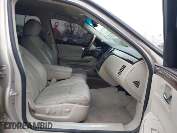 2009 Cadillac DTS w/1SA with VIN 1G6KD57Y29U137410, listed as a IAAI auction lot 42026044 with 112,916 mi miles. Bid and sale history available at carsss.com. Image 5.