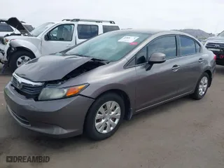 2012 Honda Civic Sdn LX with VIN 19XFB2F55CE343594, listed as a IAAI auction lot 41890065 with 119,035 mi miles. Bid and sale history available at carsss.com. Image 2.