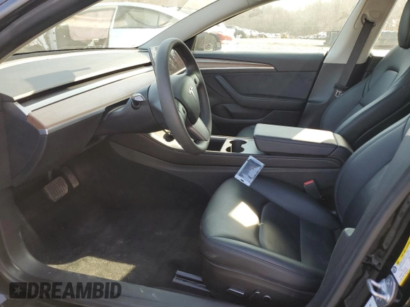 2023 Tesla Model 3 with VIN 5YJ3E1EA3PF670787, listed as a Copart auction lot 49070865 with 13,489 mi miles and Salvage title. Bid and sale history available at DreamBid. Image 7.