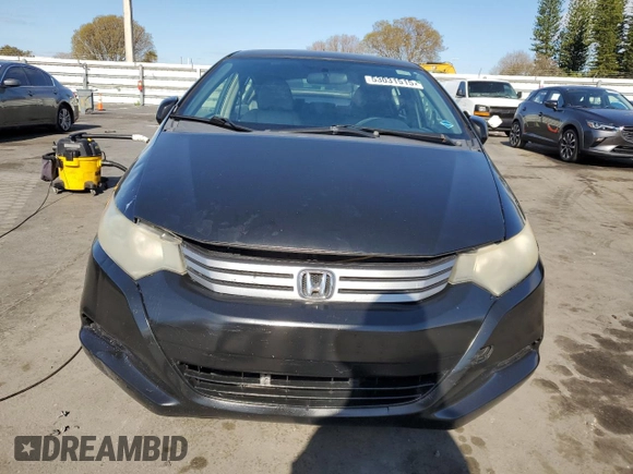 2010 Honda Insight LX with VIN JHMZE2H50AS009869, listed as a Copart auction lot 53031515 with 194,860 mi miles and Salvage Title. Bid and sale history available at DreamBid. Image 5.
