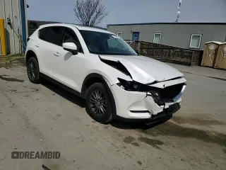 2021 Mazda CX-5 Touring z VIN JM3KFBCM9M1386068, wystawiony jako Copart lot #51735225 z przebiegiem 68 728 mil mil oraz Szkoda całkowita • Salvage title. Historia ofert i sprzedaży dostępna na DreamBid. Obrazek 11.