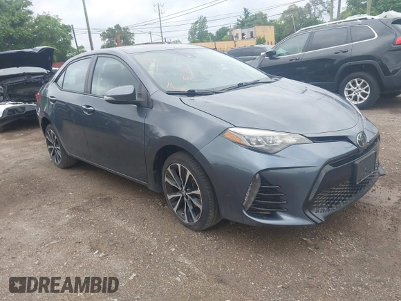 2017 Toyota Corolla L z VIN 5YFBURHE7HP633484, wystawiony jako IAAI lot #42538243 z przebiegiem 80 492 mil mil oraz . Historia ofert i sprzedaży dostępna na DreamBid. Obrazek 1.