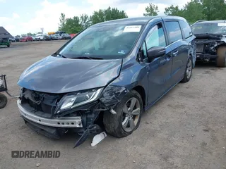 2020 Honda Odyssey EX with VIN 5FNRL6H54LB025555, listed as a IAAI auction lot 42512480 with 95,425 mi miles and . Bid and sale history available at DreamBid. Image 2.