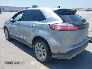 2022 Ford Edge Titanium with VIN 2FMPK4K96NBA41746, listed as a IAAI auction lot 42551594 with 86,730 mi miles and . Bid and sale history available at DreamBid. Image 3.