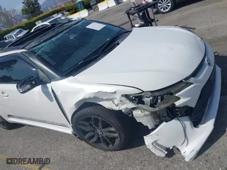 2015 Scion tC with VIN JTKJF5C71F3095189, listed as a IAAI auction lot 41847417 with 129,164 mi miles. Bid and sale history available at carsss.com. Image 6.