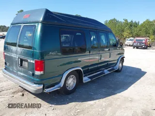 1999 Ford Econoline Cargo with VIN 1FDRE14W2XHB18989, listed as a IAAI auction lot 41740961 with 152,028 mi miles. Bid and sale history available at carsss.com. Image 4.