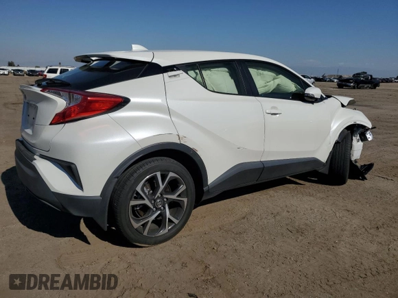 2019 Toyota C-HR XLE with VIN JTNKHMBX1K1014761, listed as a Copart auction lot 54963025 with 15,890 mi miles and Salvage Title. Bid and sale history available at DreamBid. Image 3.