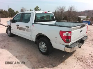 2023 Ford F-150 XL with VIN 1FTEW1CB6PKD82458, listed as a Copart auction lot 48912975 with 31,245 mi miles and Salvage Title. Bid and sale history available at carsss.com. Image 2.