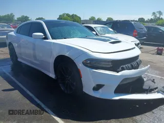 2021 Dodge Charger R/T z VIN 2C3CDXCT2MH597867, wystawiony jako IAAI lot #42212124 z przebiegiem 54 441 mil mil oraz . Historia ofert i sprzedaży dostępna na DreamBid. Obrazek 1.