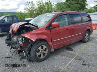2009 Dodge Grand Caravan SXT z VIN 2D8HN54129R648853, wystawiony jako Copart lot #57216155 z przebiegiem Nie podano mil oraz Szkoda całkowita • Salvage title. Historia ofert i sprzedaży dostępna na DreamBid. Obrazek 1.