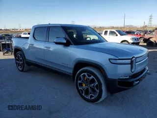 2023 Rivian R1T Adventure with VIN 7FCTGAAA7PN017844, listed as a Copart auction lot 44261105 with 4,590 mi miles and Clean Title. Bid and sale history available at carsss.com. Image 4.