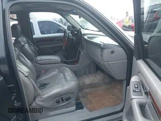 2002 Cadillac Escalade z VIN 1GYEK63N62R205809, wystawiony jako IAAI lot #41090723 z przebiegiem 180 631 mil mil oraz . Historia ofert i sprzedaży dostępna na DreamBid. Obrazek 5.
