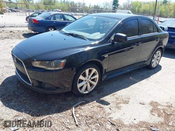 2012 Mitsubishi Lancer GT with VIN JA32U8FW6CU021485, listed as a IAAI auction lot 42159256 with 138,455 mi miles. Bid and sale history available at carsss.com. Image 2.