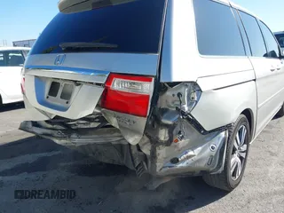 2005 Honda Odyssey TOURING with VIN 5FNRL38865B128519, listed as a IAAI auction lot 41830182 with 171,010 mi miles. Bid and sale history available at carsss.com. Image 18.