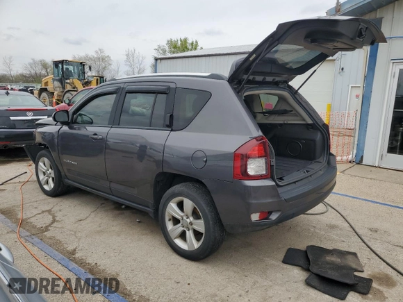 2014 Jeep Compass Latitude with VIN 1C4NJDEB4ED904731, listed as a Copart auction lot 51809165 with 104,760 mi miles and Salvage Title. Bid and sale history available at DreamBid. Image 2.