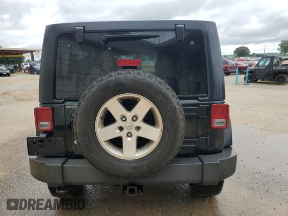 2012 Jeep Wrangler Unlimited Sport z VIN 1C4BJWDG3CL181596, wystawiony jako Copart lot #57940655 z przebiegiem 168 882 mil mil oraz Czysty tytuł • Clean title. Historia ofert i sprzedaży dostępna na DreamBid. Obrazek 6.