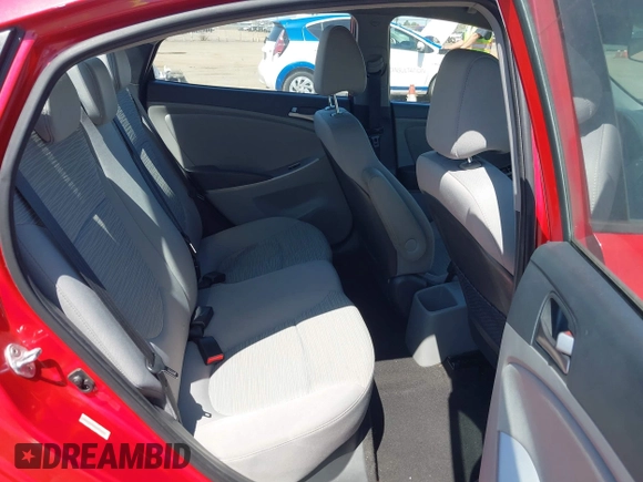 2015 Hyundai Accent GLS with VIN KMHCT4AE6FU817654, listed as a IAAI auction lot 42033692 with 134,335 mi miles and . Bid and sale history available at carsss.com. Image 8.