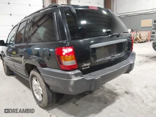 2003 Jeep Grand Cherokee Laredo with VIN 1J4GW48S63C552366, listed as a IAAI auction lot 41861501 with 227,464 mi miles. Bid and sale history available at carsss.com. Image 13.