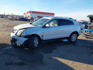 2012 Cadillac SRX Luxury Collection z VIN 3GYFNAE37CS576292, wystawiony jako IAAI lot #41048054 z przebiegiem 158 948 mil mil oraz . Historia ofert i sprzedaży dostępna na DreamBid. Obrazek 14.