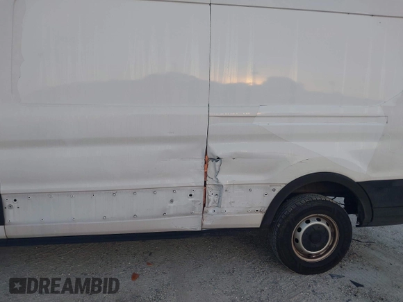 2019 Ford Transit with VIN 1FTBW2CM3KKB73018, listed as a IAAI auction lot 42240275 with 111,649 mi miles and . Bid and sale history available at DreamBid. Image 6.