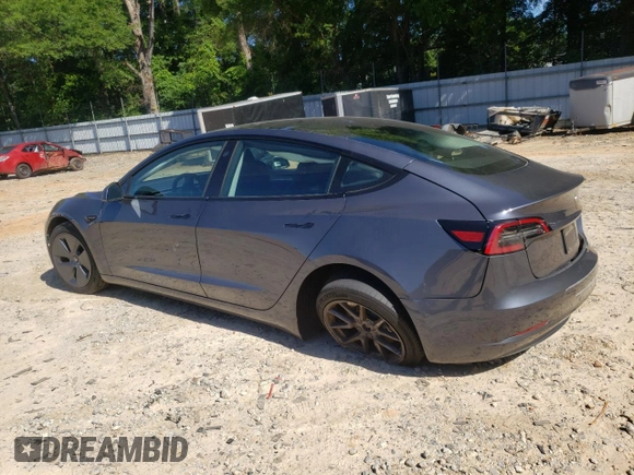 2023 Tesla Model 3 with VIN 5YJ3E1EA1PF664941, listed as a Copart auction lot 58097005 with 39,391 mi miles and Salvage title. Bid and sale history available at DreamBid. Image 2.