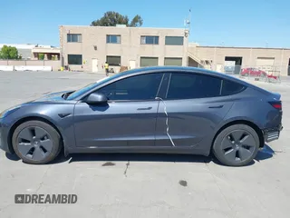 2023 Tesla Model 3 with VIN 5YJ3E1EAXPF405588, listed as a IAAI auction lot 42348952 with 30,788 mi miles and . Bid and sale history available at DreamBid. Image 15.