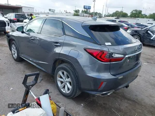 2016 Lexus RX 350 z VIN 2T2ZZMCA4GC032034, wystawiony jako IAAI lot #42095974 z przebiegiem 57 195 mil mil oraz . Historia ofert i sprzedaży dostępna na DreamBid. Obrazek 3.