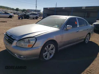 2005 Infiniti Q45 z VIN JNKBF01A75M100612, wystawiony jako Copart lot #73658824 z przebiegiem Nie podano mil oraz Nie do naprawy. Historia ofert i sprzedaży dostępna na DreamBid. Obrazek 1.