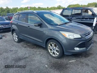 2015 Ford Escape Titanium with VIN 1FMCU9J91FUC90040, listed as a IAAI auction lot 42780681 with 171,079 mi miles and . Bid and sale history available at DreamBid. Image 1.