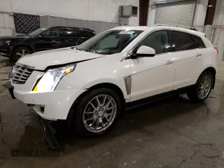 2014 Cadillac SRX Premium Collection z VIN 3GYFNGE36ES581361, wystawiony jako Copart lot #88540815 z przebiegiem 137 047 mil mil oraz Nie do naprawy. Historia ofert i sprzedaży dostępna na DreamBid. Obrazek 1.