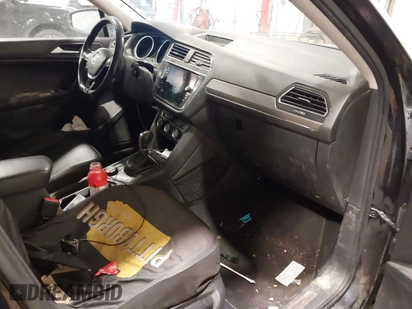 2019 Volkswagen Tiguan SE with VIN 3VV2B7AX3KM017948, listed as a IAAI auction lot 41564360 with 129,302 mi miles and . Bid and sale history available at DreamBid. Image 5.