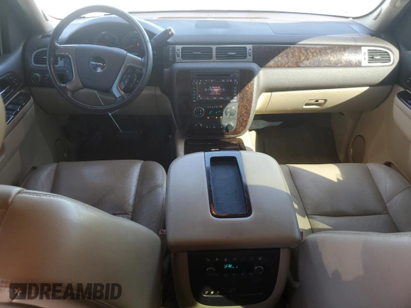 2011 GMC Yukon Denali with VIN 1GKS1EEFXBR121055, listed as a Copart auction lot 77194354 with 98,806 mi miles and Salvage Title. Bid and sale history available at carsss.com. Image 8.