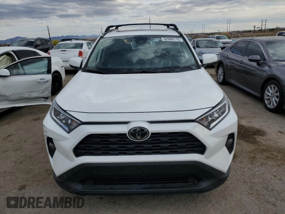 2019 Toyota RAV4 XLE with VIN 2T3W1RFVXKW043919, listed as a Copart auction lot 52998715 with 55,593 mi miles and Salvage Title. Bid and sale history available at carsss.com. Image 5.