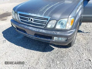 2003 Lexus LX with VIN JTJHT00W233532297, listed as a IAAI auction lot 42189676 with 235,992 mi miles. Bid and sale history available at carsss.com. Image 6.