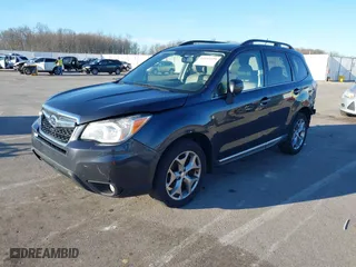 2015 Subaru Forester 2.5i Touring with VIN JF2SJAUC2FH827235, listed as a IAAI auction lot 41692229 with 182,123 mi miles. Bid and sale history available at carsss.com. Image 2.