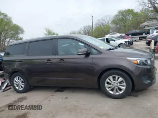 2016 Kia Sedona LX with VIN KNDMB5C17G6093362, listed as a IAAI auction lot 41996581 with 107,160 mi miles and . Bid and sale history available at DreamBid. Image 14.