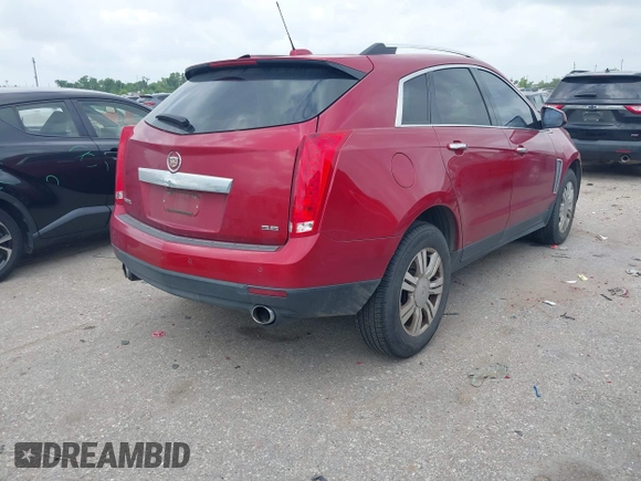 2015 Cadillac SRX Luxury Collection with VIN 3GYFNBE36FS560305, listed as a IAAI auction lot 42142934 with 160,543 mi miles and . Bid and sale history available at carsss.com. Image 4.