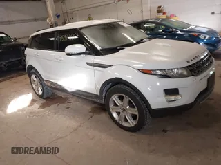 2013 Land Rover Range Rover Evoque Pure Premium z VIN SALVR2BG6DH800402, wystawiony jako IAAI lot #41593365 z przebiegiem 131 837 mil mil oraz . Historia ofert i sprzedaży dostępna na DreamBid. Obrazek 1.