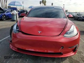 2023 Tesla Model 3 with VIN 5YJ3E1EA5PF548786, listed as a Copart auction lot 82928324 with Not Provided miles and Salvage Title. Bid and sale history available at DreamBid. Image 5.