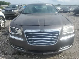 2013 Chrysler 300 z VIN 2C3CCAAG0DH589174, wystawiony jako Copart lot #59053955 z przebiegiem 182 591 mil mil oraz Tytuł czysty. Historia ofert i sprzedaży dostępna na DreamBid. Obrazek 5.