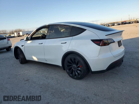 2022 Tesla Model Y Performance with VIN 7SAYGDEF8NF494770, listed as a Copart auction lot 42031405 with 28,724 mi miles and Salvage Title. Bid and sale history available at DreamBid. Image 2.