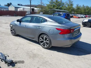 2017 Nissan Maxima SR with VIN 1N4AA6AP4HC453943, listed as a IAAI auction lot 41888527 with 130,577 mi miles and . Bid and sale history available at DreamBid. Image 3.