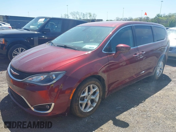 2020 Chrysler Pacifica Touring with VIN 2C4RC1FG5LR104163, listed as a IAAI auction lot 42018070 with 188,386 mi miles and . Bid and sale history available at DreamBid. Image 2.